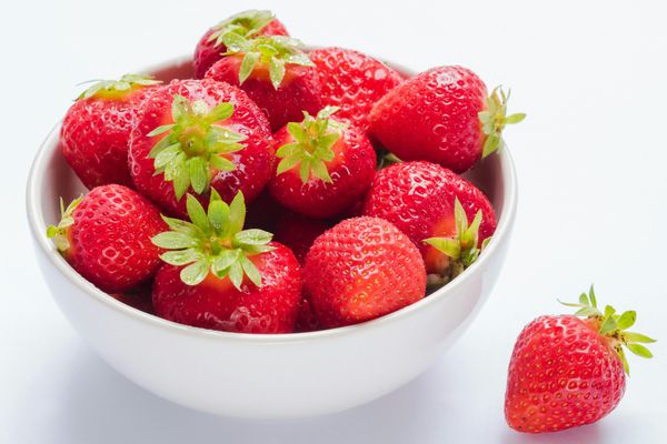 Bowl of fresh strawberry fruits